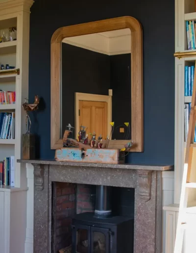 Home office alcove bookcases either side of chimney breast