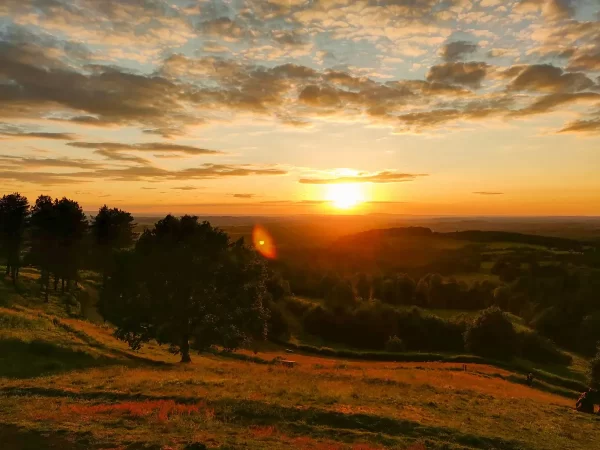 Sunset landscape with slightly cloudy sky at Clent Hills